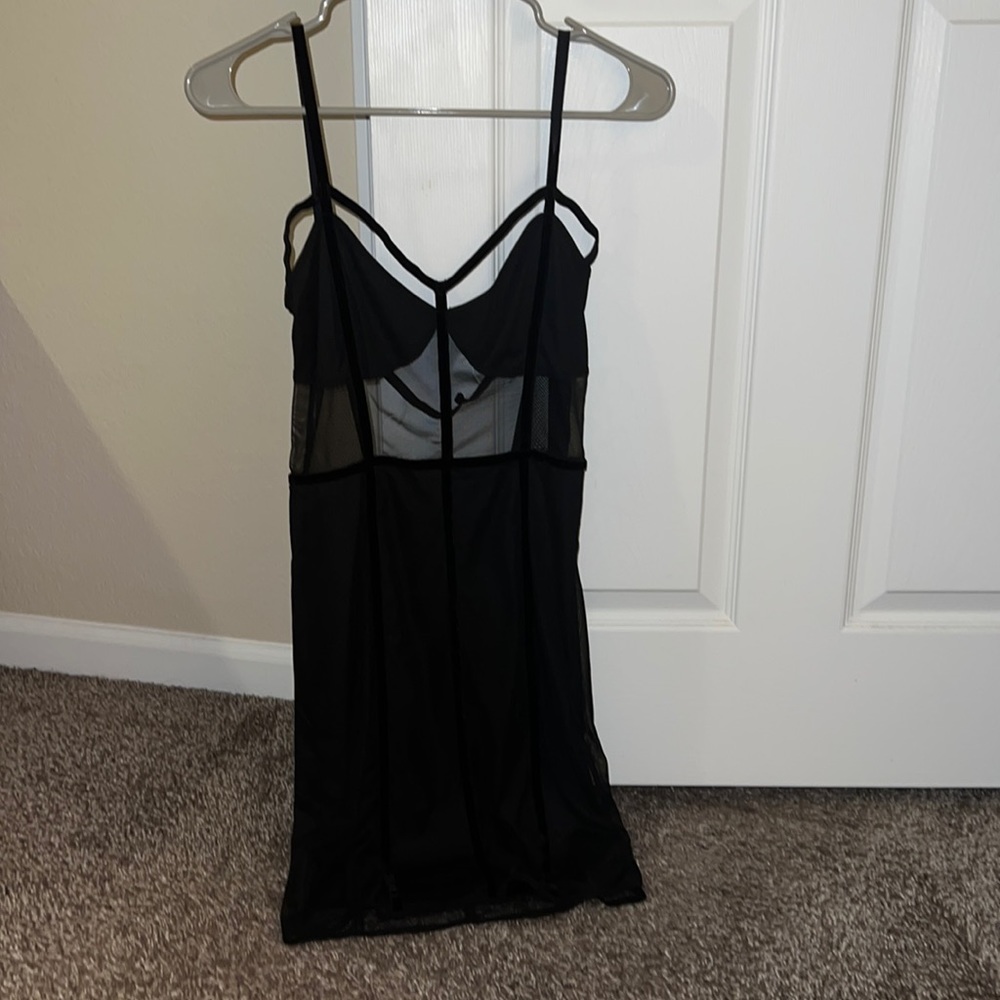Black Fashion Nova strappy dress. Open back. Size L. Brand new, with tags!
